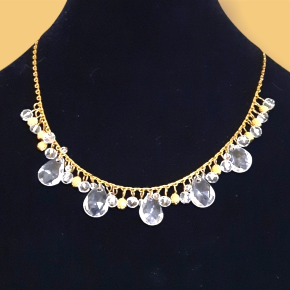 Gold tone white statement necklace